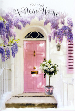 Outside a cosy Garston home, the entrance scene unfolds like a story of fresh starts and gentle hope. At its heart stands a painted pink door, softly weathered and glowing in the filtered afternoon light, a shade that feels perfectly at home among the characterful streets near Garston Park. The surrounding wall is whitewashed and calm, its subtle imperfections catching tiny shadows that make the space feel authentically lived in rather than staged. Above the frame, lush wisteria tumbles in generous waves of lavender and soft purple, each blossom dangling like a tiny bell, suggesting movement even in stillness. The florals create a natural canopy, as though nature itself had leaned over to bless this threshold. Resting just in front of the door is a chic grey-tin bucket holding a full, luxurious arrangement of creamy white roses. Each rose is at that ideal stage of opening-petals unfurling, but still tightly cupped towards the centre-surrounded by muted green foliage that feels cool and fresh, like greenery freshly trimmed from a local Liverpool garden. A blush pink ribbon encircles the bucket, tied in a soft bow that mirrors the door's romantic hue without overwhelming it. The light falls gently across the composition, catching the curves of the rose petals and drifting across the stone or concrete step in delicate patterns. It is the kind of thoughtful florist design you might choose to celebrate a new address around Garston, Aigburth or Allerton-a fragrant, understated congratulation that offers comfort, beauty, and a sense of belonging every time someone turns the key and steps inside.