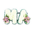 A beautifully composed floral tribute in the shape of the letters MA is shown against a clean white backdrop, highlighting every detail without distraction. Each tall capital letter is built on a sturdy frame and completely cloaked in pristine white chrysanthemums, their small, rounded blooms densely packed to create a soft, even surface with a gentle, almost quilted texture. The edges of the M and the A are carefully finished with a folded emerald-green ribbon, its pleated satin edge tracing every angle and curve to give crisp definition and a tailored finish. A narrow dark green bar discreetly connects the two letters at the base, unifying them as one piece while remaining visually subtle. At the bottom left foot of the M and the bottom right foot of the A, two symmetrical floral clusters introduce soothing hints of colour. These sprays combine lilac and blush pink roses with smaller pink spray roses, arranged so that some blooms nestle low while others tilt slightly upwards, creating depth and movement. A single airy fern frond in each cluster extends outwards in a graceful arc, softening the structure and resting like a green feather against the white petals. The overall mood is gentle, respectful, and deeply affectionate, ideal for a funeral or memorial service for a much-loved mum or Mama from Garston. The tribute's balanced design, classic sympathy flowers, and calm pastel tones suggest the work of a skilled local florist who understands how to convey remembrance, gratitude, and quiet strength when words alone are not enough.