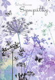 This sympathy card is like a quiet poem painted in soft watercolour, the kind of image that calls to mind a peaceful edge-of-town meadow near Garston at dusk. Airy silhouettes of wildflowers rise from the lower edge, their stems fine and slightly curved, topped with delicate, umbrella-shaped clusters that seem to hover rather than stand. The colour palette is cool and comforting: layers of lavender, indigo, soft blue and muted green glide into one another, creating a dreamy haze rather than solid blocks of colour. Within this gentle mist, the blooms appear partly transparent, their outlines dissolving at the tips as if caught in a passing breeze. Light touches of foliage and faint petal shapes drift across the background, deepening the impression of depth without cluttering the scene. Here and there, butterflies float between the flowers, wings suggested with the lightest of strokes, capturing the idea of transformation and a quiet, ongoing presence. The words With Sincere Sympathy are written above in an elegant, flowing script, resting calmly against the sky-like wash of colour. Nothing about the design feels heavy; instead, it offers a cool, soothing stillness, like stepping briefly away from the bustle of central Garston into a hidden green space. Paired with soft-toned sympathy arrangements, this card becomes a gentle companion to your condolences, wrapping your message in nature's reassurance and the quiet dignity we aim to reflect whenever we help local families express their love and remembrance.